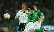 13 October 2007; Stephen Kelly, Republic of Ireland, in action against Clemens Fritz, Germany. 2008 European Championship Qualifier, Republic of Ireland v Germany, Croke Park, Dublin. Picture credit; David Maher / SPORTSFILE