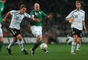 13 October 2007; Lee Carsley, Republic of Ireland, in action against Lukas Podolski, left, and Simon Rolfes, Germany. 2008 European Championship Qualifier, Republic of Ireland v Germany, Croke Park, Dublin. Picture credit; Brian Lawless / SPORTSFILE