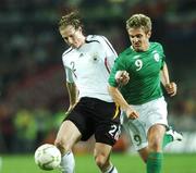 13 October 2007; David Odonnor, Germany, in action against Kevin Doyle, Republic of Ireland. 2008 European Championship Qualifier, Republic of Ireland v Germany, Croke Park, Dublin. Picture credit; Paul Mohan / SPORTSFILE