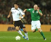 13 October 2007; Lee Carsley, Republic of Ireland, in action against Kevin Kuranyi, Germany. 2008 European Championship Qualifier, Republic of Ireland v Germany, Croke Park, Dublin. Picture credit; David Maher / SPORTSFILE