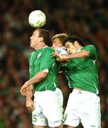 13 October 2007; Richard Dunne and Joey O'Brien, Republic of Ireland, in action against Per Mertesacker, Germany. 2008 European Championship Qualifier, Republic of Ireland v Germany, Croke Park, Dublin. Picture credit; David Maher / SPORTSFILE