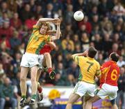 14 October 2007; Colm Byrne and Pauraic Curtis, 7, Clongeen, in action against Jason Russell and Adrian Fenlon, 6, Starlights. Wexford Senior Football Championship Final, Clongeen v Starlights, Wexford Park, Wexford. Picture credit; Matt Browne / SPORTSFILE