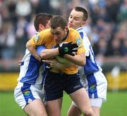 14 October 2007; Sean O'Neill, Dromore, in action against Gerard Toner and Martin Early, Coalisland. WJ Dolan Tyrone Senior Football Championship Final, Dromore v Coalisland, Healy Park, Omagh, Co. Tyrone. Picture credit; Oliver McVeigh / SPORTSFILE