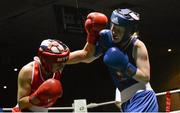 24 January 2015; Louise Donohue, Geesala, Mayo, right, exchanges punches with Debbie O'Reilly, Olympic, Galway, during their 60 kg bout. National Elite Boxing Championship Finals, National Stadium, Dublin. Picture credit: Piaras Ó Mídheach / SPORTSFILE