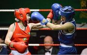 24 January 2015; Lauren Hogan, St Brigids Edenderry, left, exchanges punches with Maeve Clarke, Ballinacarrow, during their 48 kg bout. National Elite Boxing Championship Finals, National Stadium, Dublin. Picture credit: Piaras Ó Mídheach / SPORTSFILE