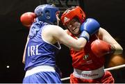 24 January 2015; Christina Desmond, Macroom, Cork, right, exchanges punches with Clare Grace, Callan, Kilkenny, during their 69 kg bout. National Elite Boxing Championship Finals, National Stadium, Dublin. Picture credit: Piaras Ó Mídheach / SPORTSFILE