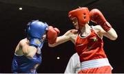 24 January 2015; Ceire Smith, Cavan, right, exchanges punches with Kristina O'Hara, Emerald, during their 51 kg bout. National Elite Boxing Championship Finals, National Stadium, Dublin. Picture credit: Piaras Ó Mídheach / SPORTSFILE