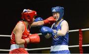 24 January 2015; Louise Donohue, Geesala, Mayo, right, exchanges punches with Debbie O'Reilly, Olympic, Galway, during their 60 kg bout. National Elite Boxing Championship Finals, National Stadium, Dublin. Picture credit: Piaras Ó Mídheach / SPORTSFILE