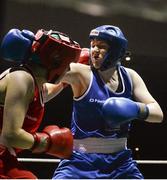 24 January 2015; Clare Grace, Callan, Kilkenny, right, exchanges punches with Christina Desmond, Macroom, Cork, during their 69 kg bout. National Elite Boxing Championship Finals, National Stadium, Dublin. Picture credit: Piaras Ó Mídheach / SPORTSFILE