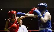 24 January 2015; Clare Grace, Callan, Kilkenny, right, exchanges punches with Christina Desmond, Macroom, Cork, during their 69 kg bout. National Elite Boxing Championship Finals, National Stadium, Dublin. Picture credit: Piaras Ó Mídheach / SPORTSFILE