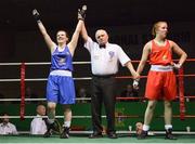 24 January 2015; Clare Grace, Callan, Kilkenny, left, celebrates after being announced winner of her 69kg bout with Christina Desmond, Macroom, Cork. National Elite Boxing Championship Finals, National Stadium, Dublin. Picture credit: Piaras Ó Mídheach / SPORTSFILE
