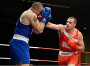 23 January 2015: Dean Gardiner, right, Clonmel Boxing Club, Tipperary, exchanges punches with Constantin Popovicu, Johnstown Boxing Club, Meath, during their 91kg bout. National Elite Boxing Championship Finals, National Stadium, Dublin. Picture credit: Ray Lohan / SPORTSFILE