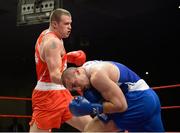 23 January 2015: Dean Gardiner, left, Clonmel Boxing Club, Tipperary, exchanges punches with Constantin Popovicu, Johnstown Boxing Club, Meath, during their 91kg bout. National Elite Boxing Championship Finals, National Stadium, Dublin. Picture credit: Ray Lohan / SPORTSFILE