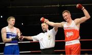 23 January 2015: Michael O'Reilly, Portlaoise Boxing Club, celebrates victory over Stephen Broadhurst, Dealgan Boxing Club, Dundalk, after their 75kg bout. National Elite Boxing Championship Finals, National Stadium, Dublin. Picture credit: Ray Lohan / SPORTSFILE
