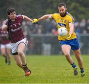 25 January 2015; Senan Kilbride, Roscommon, in action against David Walsh, Galway. FBD Connacht League Final, Roscommon v Galway, Kiltoom, Co. Roscommon. Picture credit: David Maher / SPORTSFILE