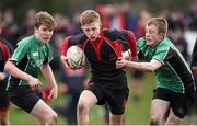 26 January 2015; Gary Hawe, Wesley College, is tackled by Padraig MacMahon, left, and Jake Elliott, Scoil Chonglais Baltinglass. Bank of Ireland Leinster Schools Fr. Godfrey Cup Semi-Final, Wesley College v Scoil Chonglais Baltinglass. Coolmine RFC, Dublin. Picture credit: Pat Murphy / SPORTSFILE