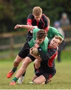 26 January 2015; Dean Cassells, Scoil Chonglais Baltinglass, is tackled by Gary Hawe, left, and Dane Laird, Wesley College. Bank of Ireland Leinster Schools Fr. Godfrey Cup Semi-Final, Wesley College v Scoil Chonglais Baltinglass. Coolmine RFC, Dublin. Picture credit: Pat Murphy / SPORTSFILE