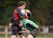 26 January 2015; Noah Young, Wesley College, is tackled by Adam Wynne, Scoil Chonglais Baltinglass. Bank of Ireland Leinster Schools Fr. Godfrey Cup Semi-Final, Wesley College v Scoil Chonglais Baltinglass. Coolmine RFC, Dublin. Picture credit: Pat Murphy / SPORTSFILE