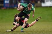 26 January 2015; Aaron Byrne, Scoil Chonglais Baltinglass, is tackled by Ian Sheridan, Wesley College. Bank of Ireland Leinster Schools Fr. Godfrey Cup Semi-Final, Wesley College v Scoil Chonglais Baltinglass. Coolmine RFC, Dublin. Picture credit: Pat Murphy / SPORTSFILE