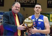 25 January 2015; Dan Griffin, C&S Blue Demons, is presented with is MVP award by Bernard O'Byrne, Secetary General of Basketball Ireland. Basketball Ireland President's Cup Final, C&S Blue Demons v SSE Airtricity Moycullen. National Basketball Arena, Tallaght, Dublin. Photo by Sportsfile