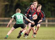 26 January 2015; Noah Young, Wesley College, is tackled by Jake Elliott, Scoil Chonglais Baltinglass. Bank of Ireland Leinster Schools Fr. Godfrey Cup Semi-Final, Wesley College v Scoil Chonglais Baltinglass. Coolmine RFC, Dublin. Picture credit: Pat Murphy / SPORTSFILE