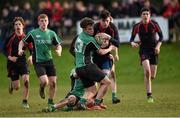 26 January 2015; Karl O'Connor, Wesley College, is tackled by Dean Cassells and Aaron Barrett, partially hidden, Scoil Chonglais Baltinglass. Bank of Ireland Leinster Schools Fr. Godfrey Cup Semi-Final, Wesley College v Scoil Chonglais Baltinglass. Coolmine RFC, Dublin. Picture credit: Pat Murphy / SPORTSFILE