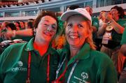 2 October 2007; Team 2007 volunteers Breege Kennedy and Patricia Ann Harrington await the arrival of Team Ireland into the stadium during the opening ceremony of the 2007 Special Olympics World Summer Games, Shanghai Stadium, Shanghai, China. Picture credit: Ray McManus / SPORTSFILE
