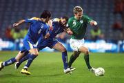 17 October 2007; Kevin Doyle, Republic of Ireland, in action against Stelios Okkarides and Marios Ilia, left, Cyprus. 2008 European Championship Qualifier, Republic of Ireland v Cyprus, Croke Park, Dublin. Picture credit; Pat Murphy / SPORTSFILE