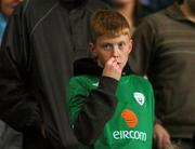 17 October 2007; A young Republic of Ireland fan watches the dying moments of the match. 2008 European Championship Qualifier, Republic of Ireland v Cyprus, Croke Park, Dublin. Picture credit; Brian Lawless / SPORTSFILE