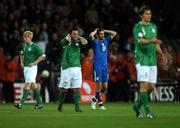 17 October 2007; Republic of Ireland's Andy Reid and Paul McShane, left, show their disappointment at the final whistle alongside Alexandros Garposis, Cyprus. 2008 European Championship Qualifier, Republic of Ireland v Cyprus, Croke Park, Dublin. Picture credit; Pat Murphy / SPORTSFILE
