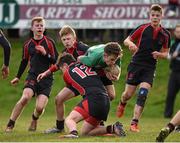 26 January 2015; Padraig MacMahon, Scoil Chonglais Baltinglass, is tackled by, from left, Dane Laird, Gary Hawe, Michael McKeon and Sam Darley, Wesley College. Bank of Ireland Leinster Schools Fr. Godfrey Cup Semi-Final, Wesley College v Scoil Chonglais Baltinglass. Coolmine RFC, Dublin. Picture credit: Pat Murphy / SPORTSFILE