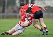 27 January 2015; Donough Leahy, Cork IT, is fouled by Brian O'Driscoll, UCC. Independent.ie Sigerson Cup, Round 1, UCC v Cork IT, Mardyke, Cork. Picture credit: Barry Cregg / SPORTSFILE