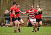 27 January 2015; Darragh Tracey, Cork IT, in action against Conor Dorman, left, Jack McGuire, centre, and Padraig O'Connor, UCC. Independent.ie Sigerson Cup, Round 1, UCC v Cork IT, Mardyke, Cork. Picture credit: Barry Cregg / SPORTSFILE