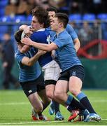 27 January 2015; Mark Fogarty, St Mary's College, is tackled by Jack Kelly, left, and James Hickey, St Michael's College. Bank of Ireland Leinster Schools Senior Cup, 1st Round, St Michael's College v St Mary's College, Donnybrook Stadium, Donnybrook, Dublin. Picture credit: Pat Murphy / SPORTSFILE
