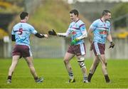 28 January 2015; Ronan Steede, centre, GMIT, celebrates with team-mate Shane O'Malley, left, at the end of the game. Independent.ie Sigerson Cup, Round 1, GMIT v DIT. Tuam Stadium, Tuam, Co. Galway. Picture credit: David Maher / SPORTSFILE