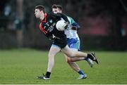 28 January 2015; John Lane, Trinity College, in action against Dan Warton, Athlone IT. Independent.ie Sigerson Cup, Preliminary Round, Trinity College v Athlone IT. Clanna Gael GAC, Ringsend, Dublin. Picture credit: Barry Cregg / SPORTSFILE