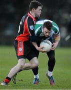 28 January 2015; Darren Farley, Athlone IT, in action against Gary O'Donoghue, Trinity College. Independent.ie Sigerson Cup, Preliminary Round, Trinity College v Athlone IT. Clanna Gael GAC, Ringsend, Dublin. Picture credit: Barry Cregg / SPORTSFILE