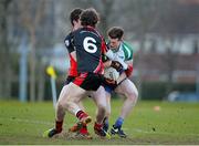 28 January 2015; Colm O'Brien, Athlone IT, in action against Shane Byrne, extreme left, and Tiernan Daly, Trinity College. Independent.ie Sigerson Cup, Preliminary Round, Trinity College v Athlone IT. Clanna Gael GAC, Ringsend, Dublin. Picture credit: Barry Cregg / SPORTSFILE