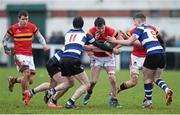 28 January 2015; Michael Clune, CBC, is tackled by Glenn Dickinson, left, Evan Moloney, centre, and Jack Lyons, Crescent College. SEAT Munster Schools Senior Cup, Round 1, Crescent College v CBC. Tom Clifford Park, Limerick. Picture credit: Diarmuid Greene / SPORTSFILE
