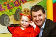 18 October 2007; Soccer legend and former Irish International player Denis Irwin, with 2 year old Jodie Flynn, on a visit to Temple Street Children's University Hospital, to launch the 'Trick or Treat' campaign. 'Trick or Treat' will run from the 24th October to the 31st October 2007, with key rings being sold at Tesco stores, shopping centres, on-street locations and workplaces nationwide. You can also support Temple Street by texting Treat to 57502, each text costs 2euro. Temple Street, Dublin. Picture credit: Matt Browne / SPORTSFILE