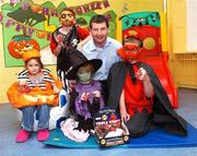 18 October 2007; Soccer legend and former Irish International player Denis Irwin, with from left, 4 year old, Caoimhe Falon, 10 year old, Liam Gannon, 6 year old, Jordon Hazzard and 9 year old, Adam Savage, on a visit to Temple Street Children's University Hospital, to launch the 'Trick or Treat' campaign. 'Trick or Treat' will run from the 24th October to the 31st October 2007, with key rings being sold at Tesco stores, shopping centres, on-street locations and workplaces nationwide. You can also support Temple Street by texting Treat to 57502, each text costs 2euro. Temple Street, Dublin. Picture credit: Matt Browne / SPORTSFILE  *** Local Caption ***