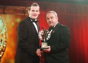 19 October 2007; Jackie Tyrrell of Kilkenny is presented with his Vodafone GAA All-Star award by Nickey Brennan, President of the GAA, during the 2007 Vodafone GAA All-Star Awards. Citywest Hotel, Conference, Leisure & Golf Resort, Saggart, Co. Dublin. Picture credit: Brendan Moran / SPORTSFILE