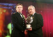19 October 2007; Stephen Molumphy of Waterford is presented with his Vodafone GAA All-Star award by Nickey Brennan, President of the GAA, during the 2007 Vodafone GAA All-Star Awards. Citywest Hotel, Conference, Leisure & Golf Resort, Saggart, Co. Dublin. Picture credit: Brendan Moran / SPORTSFILE