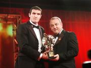 19 October 2007; Graham Canty of Cork is presented with his Vodafone GAA All-Star award by Nickey Brennan, President of the GAA, during the 2007 Vodafone GAA All-Star Awards. Citywest Hotel, Conference, Leisure & Golf Resort, Saggart, Co. Dublin. Picture credit: Brendan Moran / SPORTSFILE