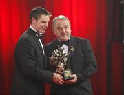 19 October 2007; Stephen Bray of Meath is presented with his Vodafone GAA All-Star award by Nickey Brennan, President of the GAA, during the 2007 Vodafone GAA All-Star Awards. Citywest Hotel, Conference, Leisure & Golf Resort, Saggart, Co. Dublin. Picture credit: Ray McManus / SPORTSFILE