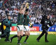 20 October 2007; The South African locks Bakkies Botha, left, and Victor Matfield celebrate winning the Rugby World Cup Final as they lift the Webb Ellis Cup. Rugby World Cup Final, South Africa v England,Stade de France, Paris. Picture credit; David Gibson / SPORTSFILE