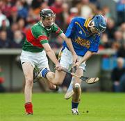 21 October 2007; Johnny Ryan, Drom Inch, in action against Tom King, Loughmore Castleiney. Tipperary Senior Hurling Championship Final, Loughmore Castleiney v Drom Inch, Semple Stadium, Thurles, Tipperary.Picture credit: Brendan Moran / SPORTSFILE