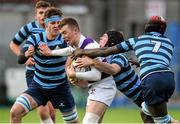 29 January 2015; Michael McDermott, Clongowes Wood College, is tackled by Anthony Healy, left, Richard McHugh, centre, and Bilal M'Uazzam, right, Castleknock College. Bank of Ireland Leinster Schools Senior Cup, 1st Round, Clongowes Wood College v Castleknock College. Donnybrook Stadium, Donnybrook, Dublin. Picture credit: Pat Murphy / SPORTSFILE