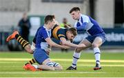 30 January 2015; Matthew Bursey, The Kings Hospital, is tackled by Ben Nolke, left, and Gary Fearon, St Andrew's College. The Kings Hospital v St Andrew's College, Bank of Ireland Leinster Schools Senior Cup, 1st Round. Donnybrook Stadium, Donnybrook, Dublin. Picture credit: Piaras Ó Mídheach / SPORTSFILE