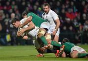 30 January 2015; Thomas Waldrom, England Saxons, is tackled by Mike McCarthy, top, and Richardt Strauss, Ireland Wolfhounds. Ireland Wolfhounds v England Saxons, International Friendly. Irish Independent Park, Cork.  Picture credit: Matt Browne / SPORTSFILE